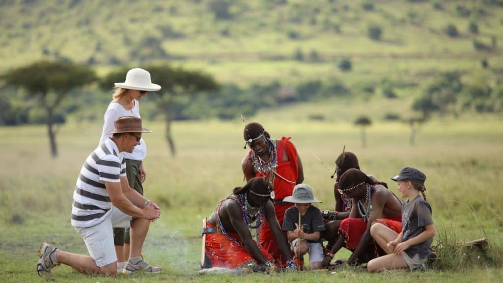 Kenya Kichwa WILDchild Maasai teaching family to make a fire Website 1920x1080 fill gravityauto
