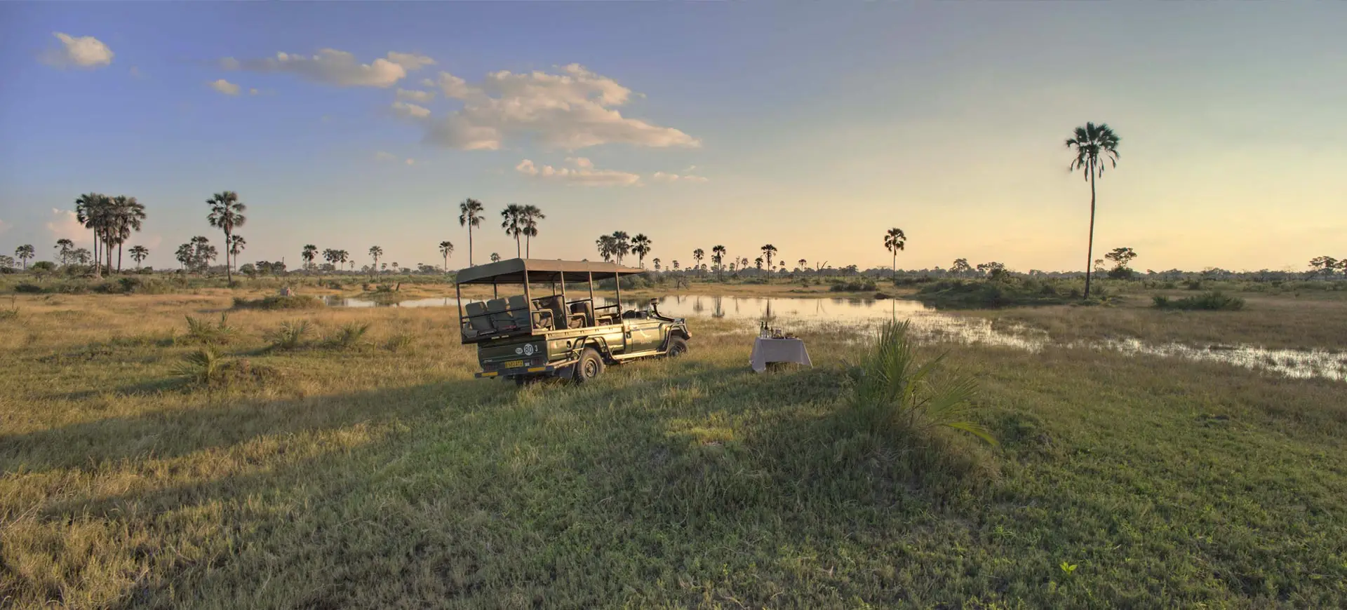 Okavango Delta Travel Guide: Botswana Safaris With Cheetah Safaris 10 Sundowner in Okavango over sunset