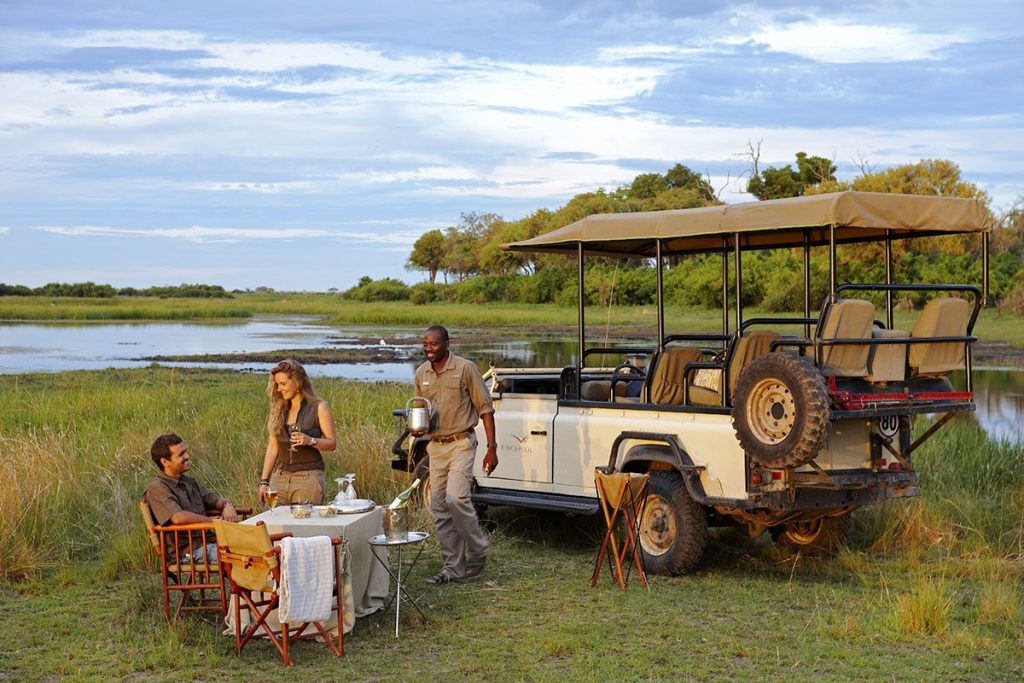 Best Safari Honeymoon Destinations: Where Romance Meets Adventure 7 Botswana Linyanti WildernessSafaris KingsPool Dining GameDrive Sundowners