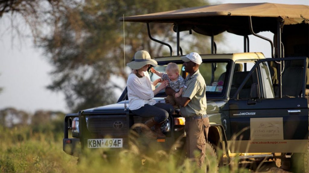 A family in Masai Mara on Game Drive